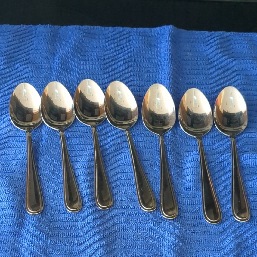 Set of Seven Stainless Steel Spoons